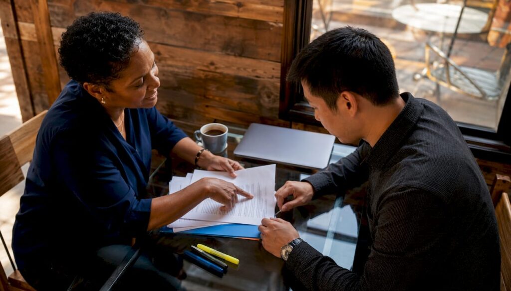 Agent and client reviewing ROFR contract