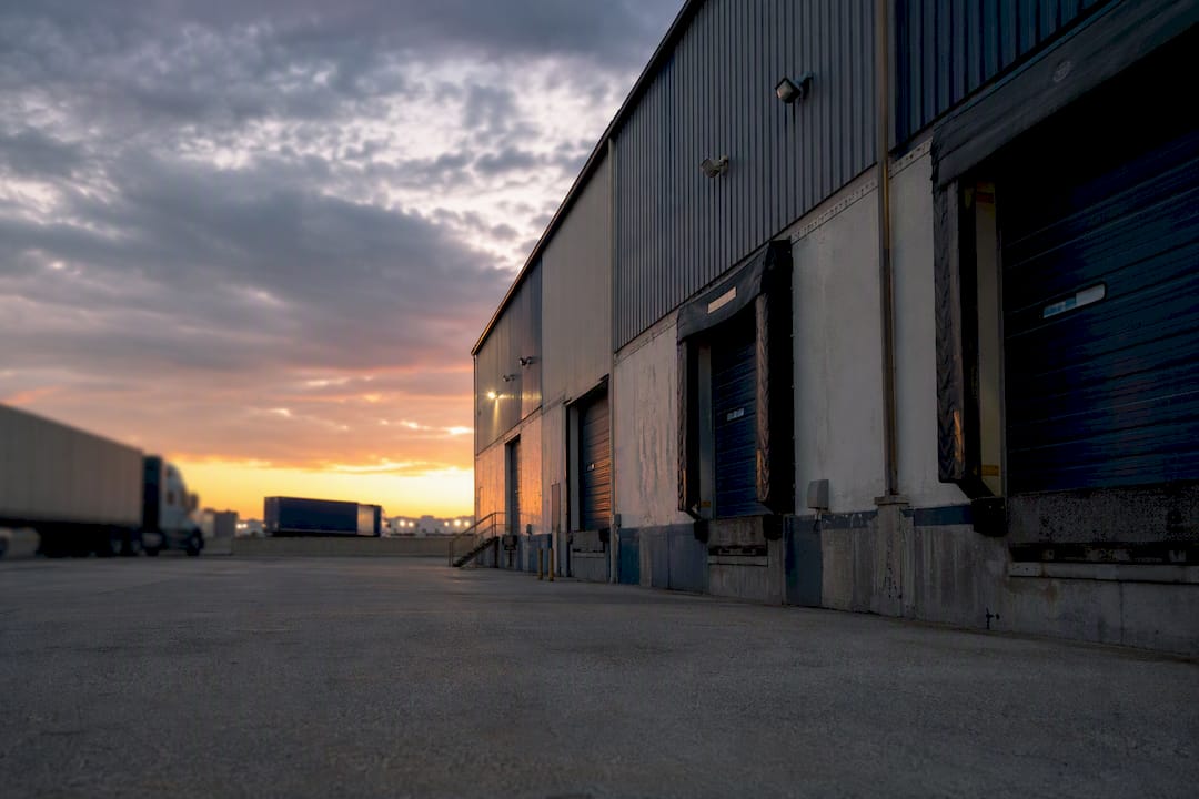 Industrial manufacturing plant exterior at dawn