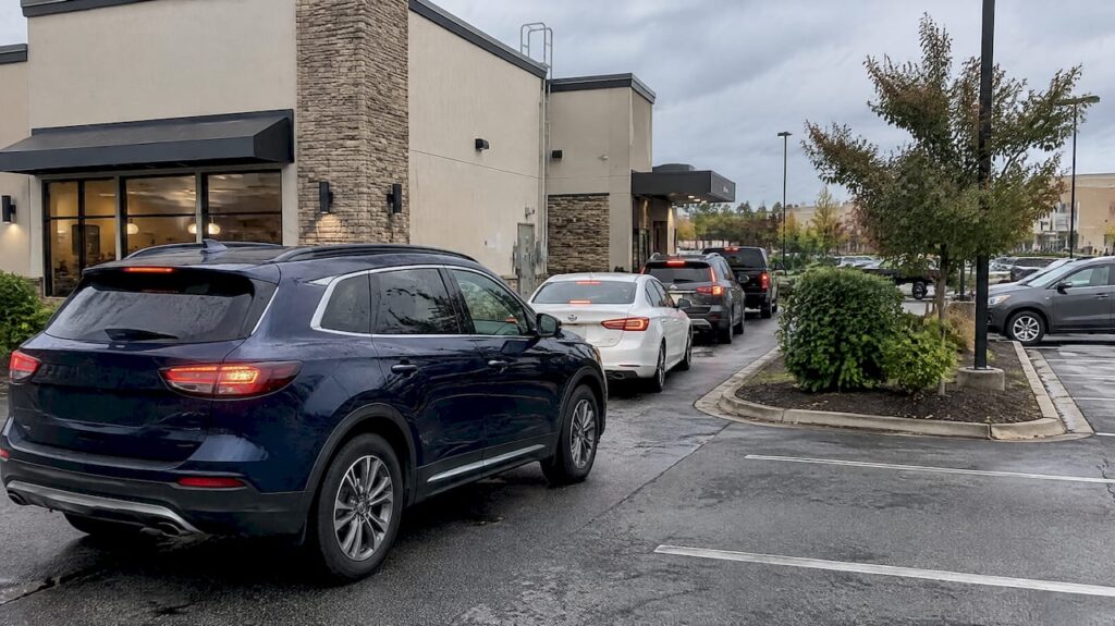 Drive-thru queue spilling into a parking aisle