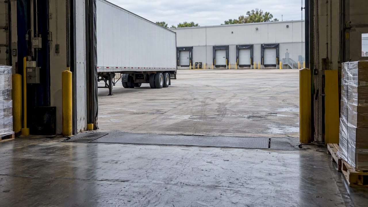 Warehouse loading docks opening onto truck court