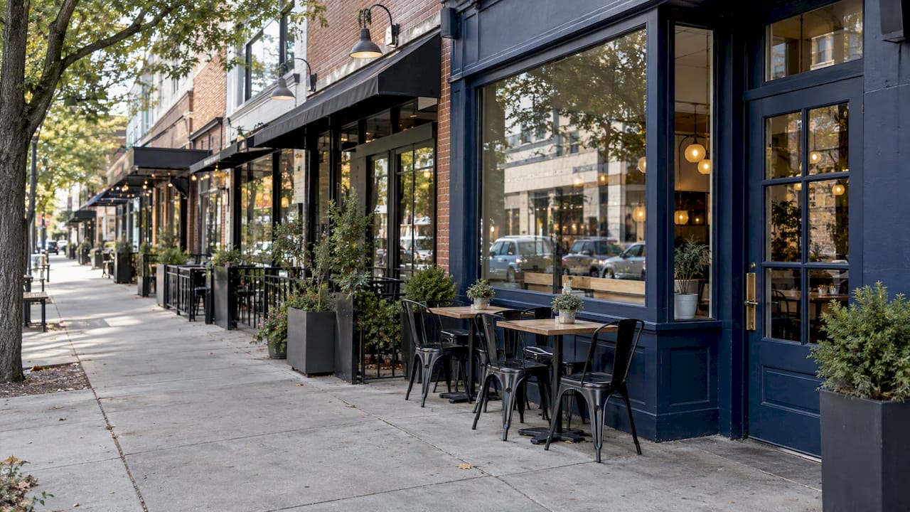 Dense South End restaurant storefronts along sidewalk